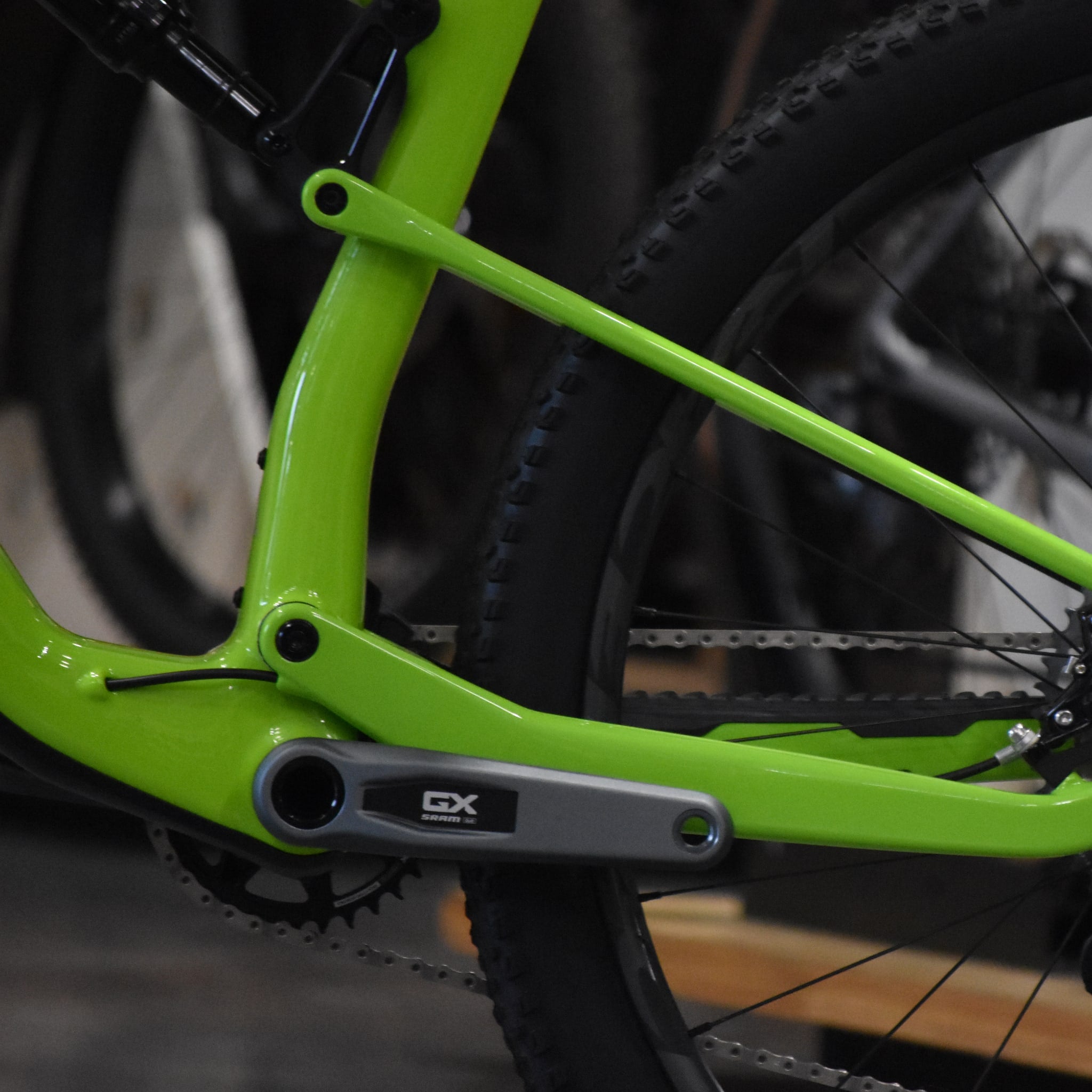 Non-drive side shot of the SuperLight suspension layout on a Gloss Spring Green Santa Cruz Blur