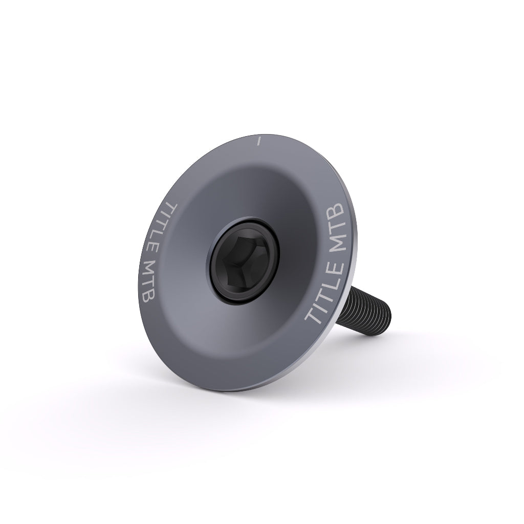 Chapeau supérieur et boulon